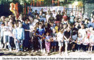 Students of the Toronto Ability School in front of their brand-new playground