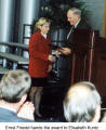 Ernst Friedel hands the award to Elisabeth Kuntz