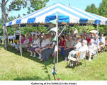 Gathering of the faithful (in the shade)