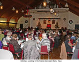 Christmas carolling in the festice decorated Hansa Haus