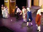 Scene from Barber of Seville (Opera York) [photo: Rolf Rentmeister]