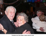 President Joe Folk enjoys a dance with his wife