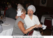 Mrs. Dahnert (r.) impressed with her cook/baker costume