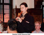 Playing a South American flute
