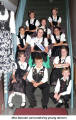Miss Danube surrounded by young dancers